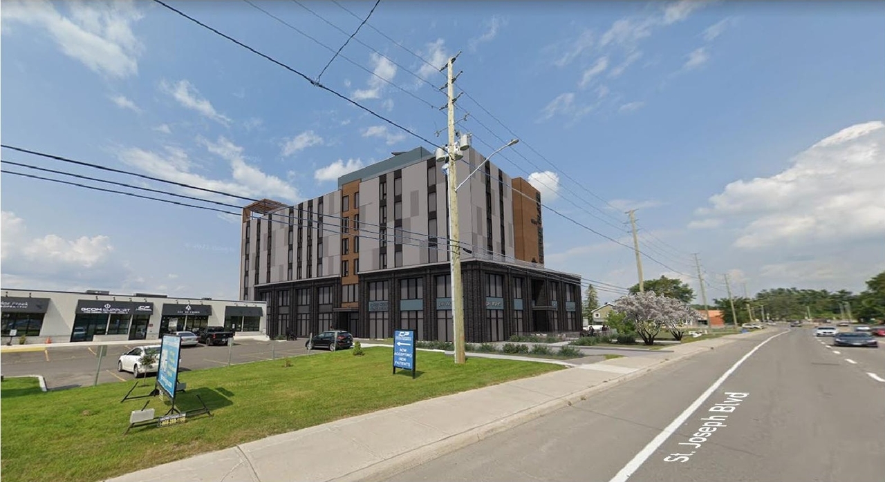 Rendering of building from page 6 of the file '2023-05-15 - Design Brief - D02-02-23-0039'