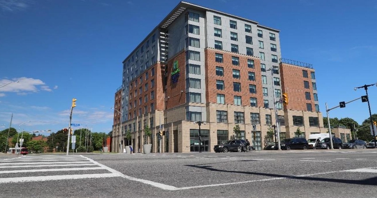 Rendering of building from page 7 of the file '2021-08-23 - Design Brief - D07-12-21-0128'