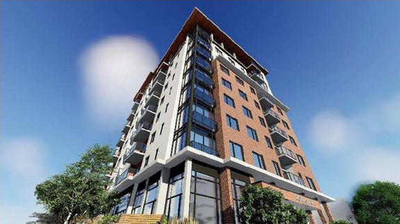 Rendering of building from page 11 of the file '2023-05-11 - Design Brief - D07-12-21-0189'