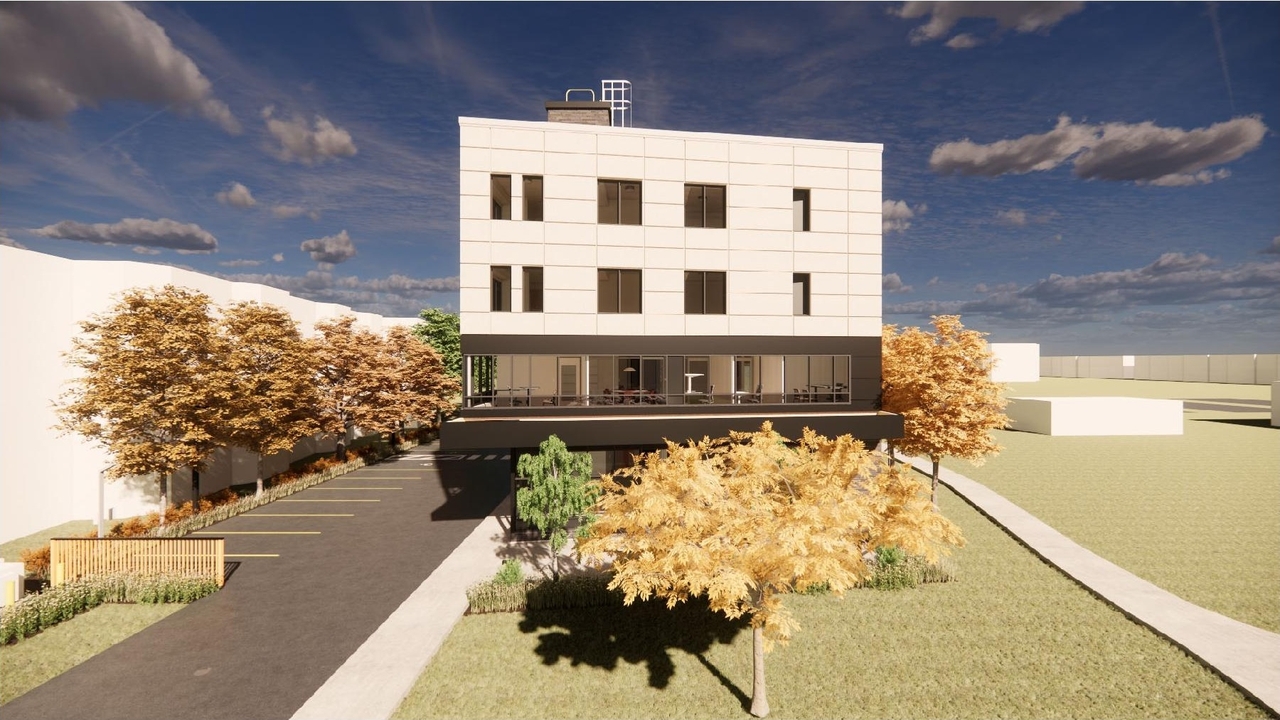 Rendering of building from page 31 of the file '2023-09-05 - PLANNING RATIONALE & DESIGN BRIEF - D07-12-22-0182'