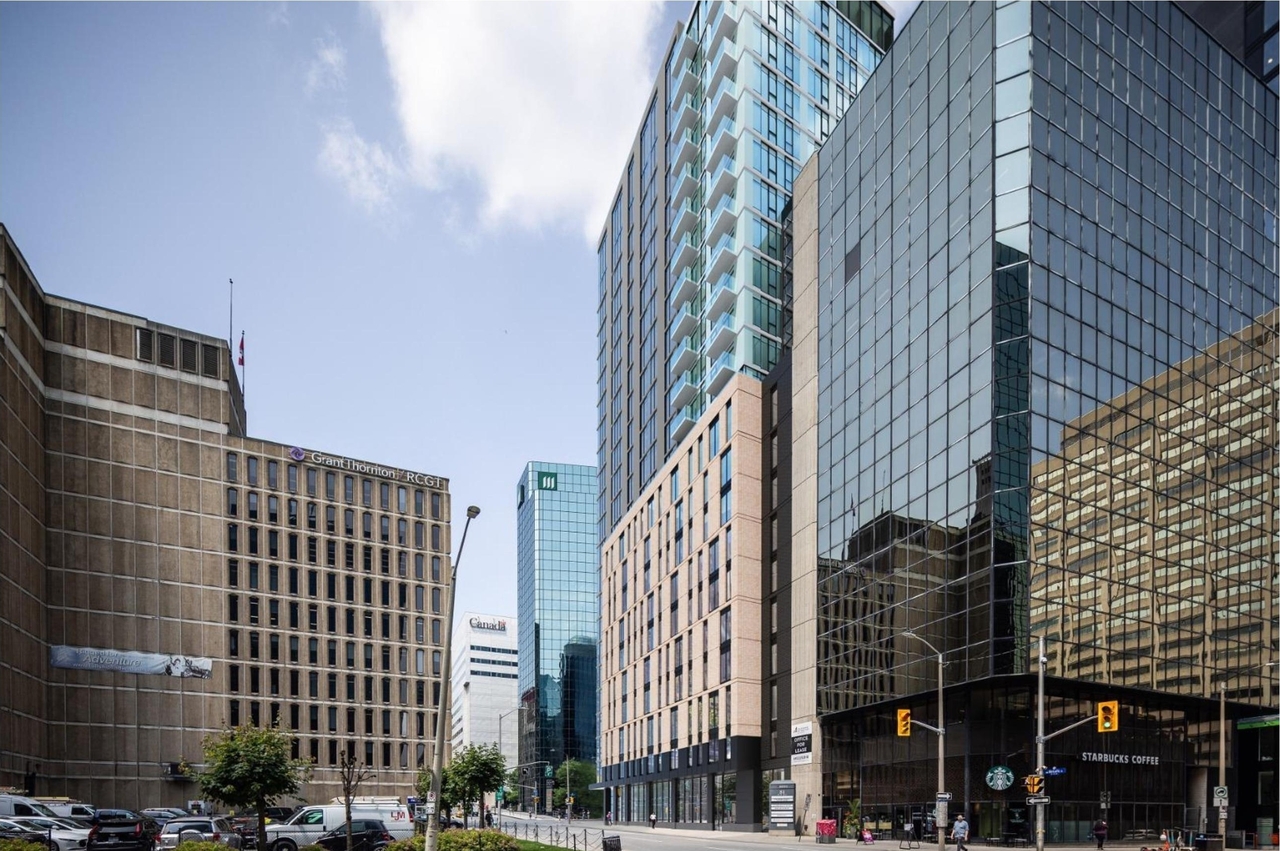 Rendering of building from page 33 of the file '2025-08-06 - Urban Design Review Panel Report - D07-12-25-0112'